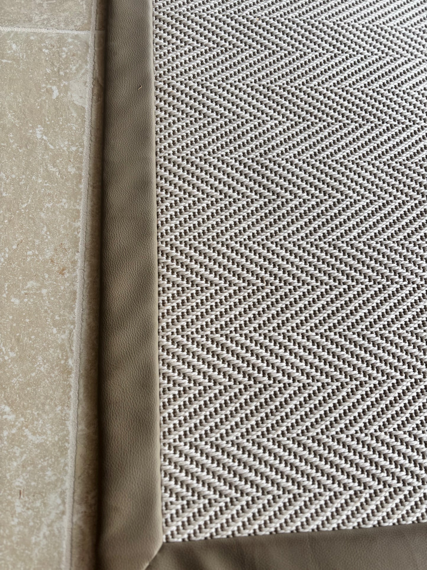 Unnatural Flooring Chevron Rug with Brown Leather Edging