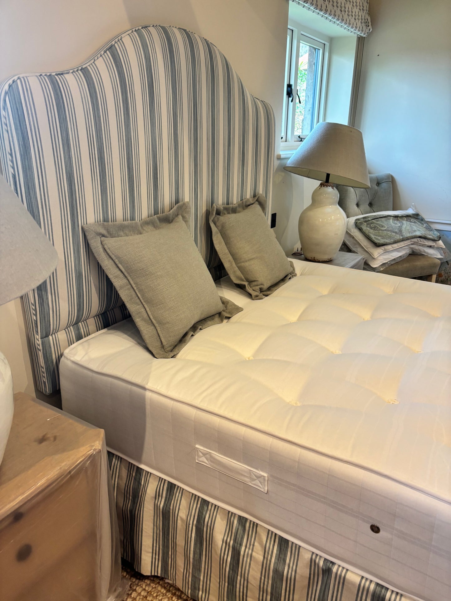 Bespoke Kingsize Bed with Blue and Cream Stripe Upholstered Headboard matching Valence and drawers each side.  Coach House Orthopedic Mattrress