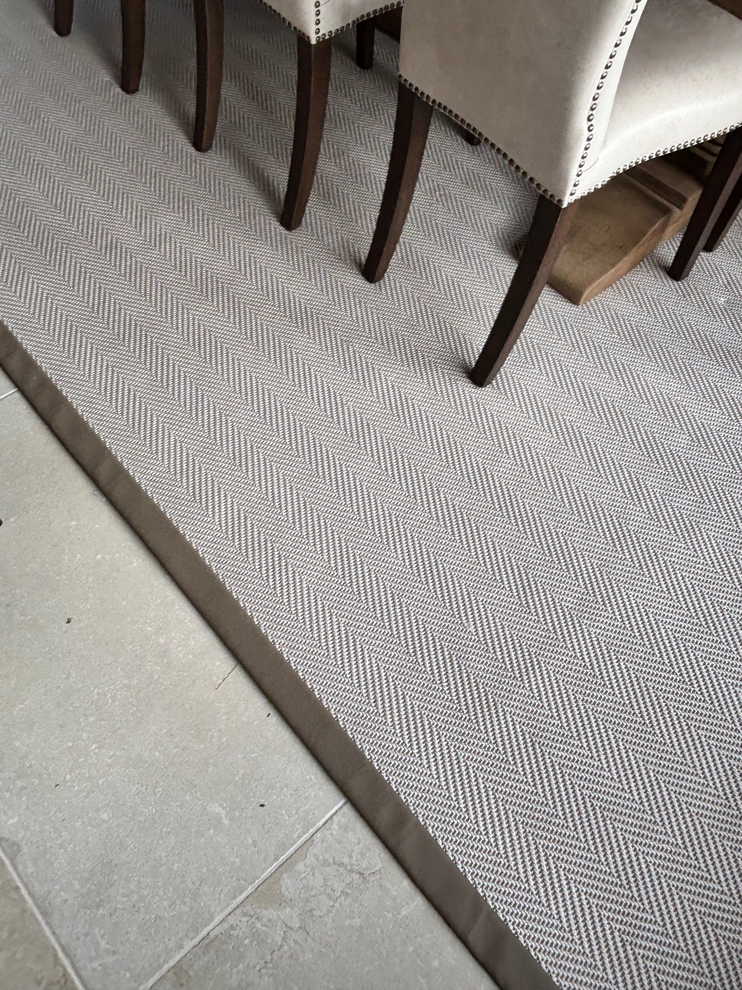 Unnatural Flooring Chevron Rug with Brown Leather Edging