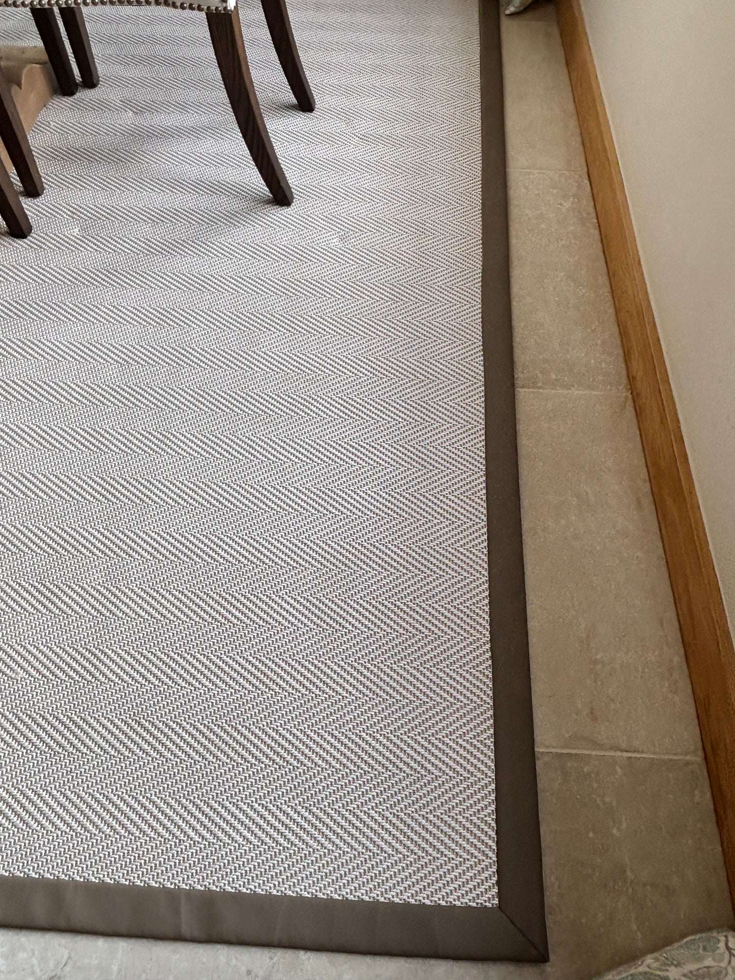 Unnatural Flooring Chevron Rug with Brown Leather Edging