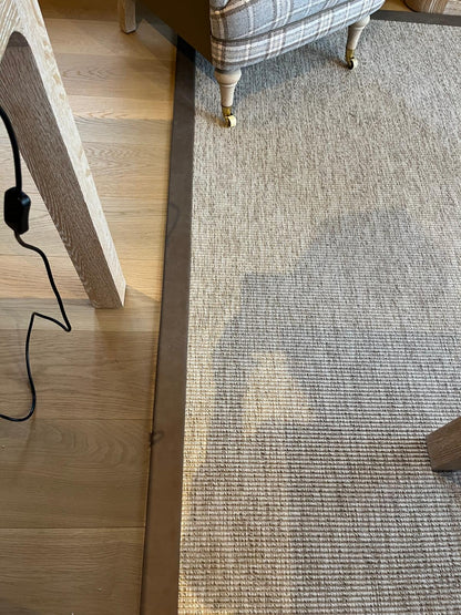UnNatural Flooring Cream Rug with Brown Suede Edging