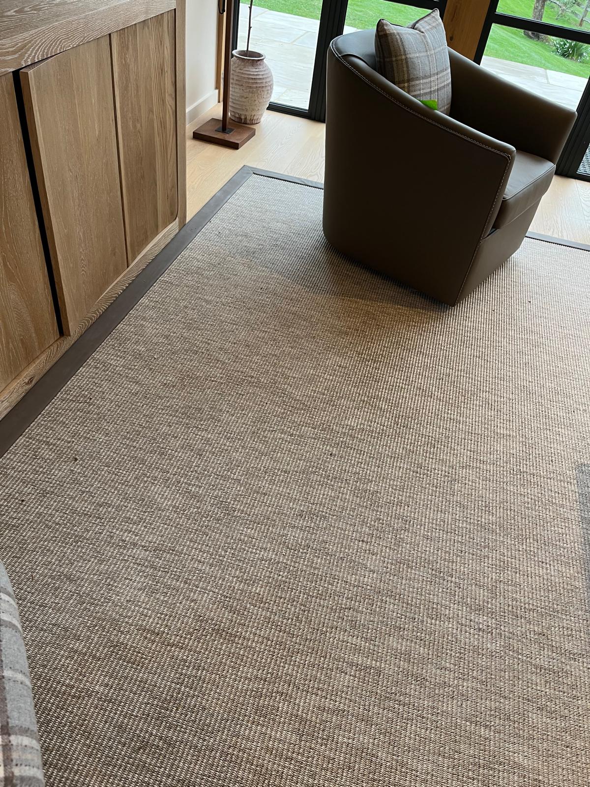 UnNatural Flooring Cream Rug with Brown Suede Edging