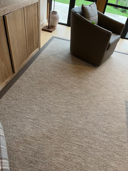 UnNatural Flooring Cream Rug with Brown Suede Edging