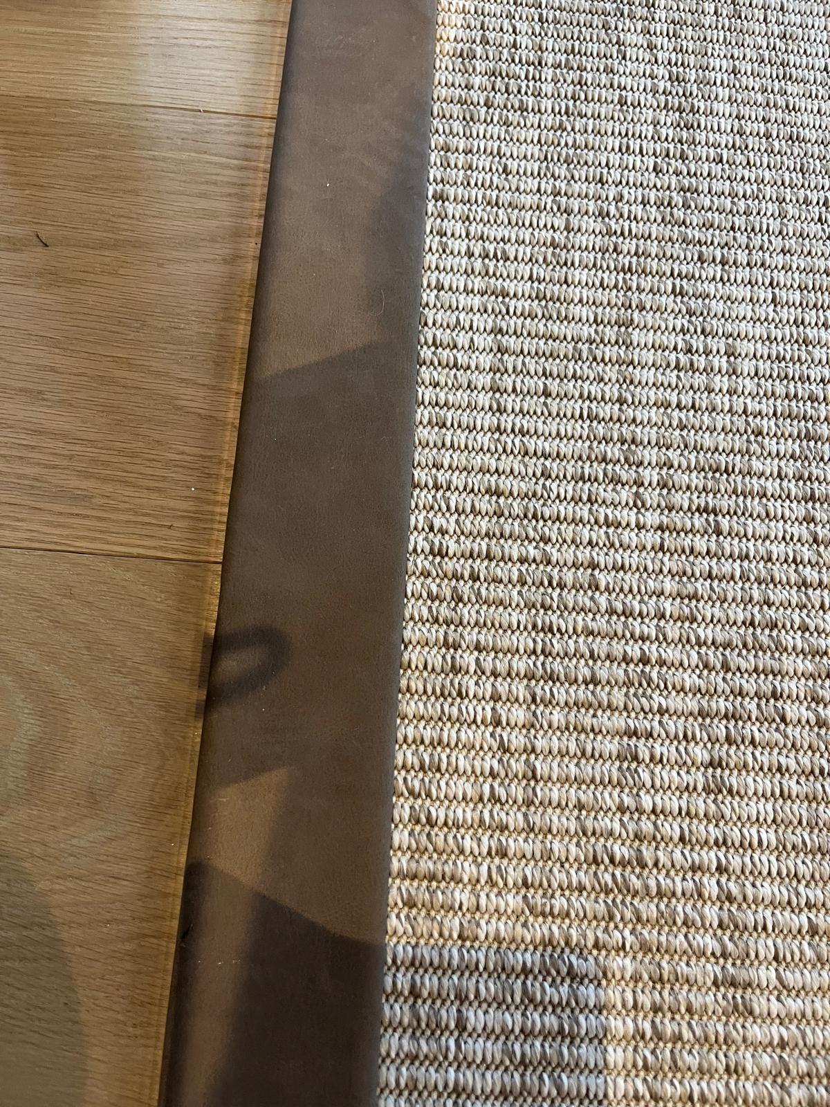 UnNatural Flooring Cream Rug with Brown Suede Edging