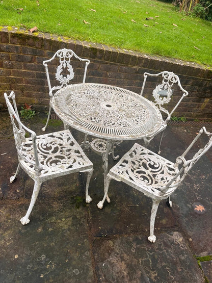 White Metal Bistro Style Table And Four Chairs