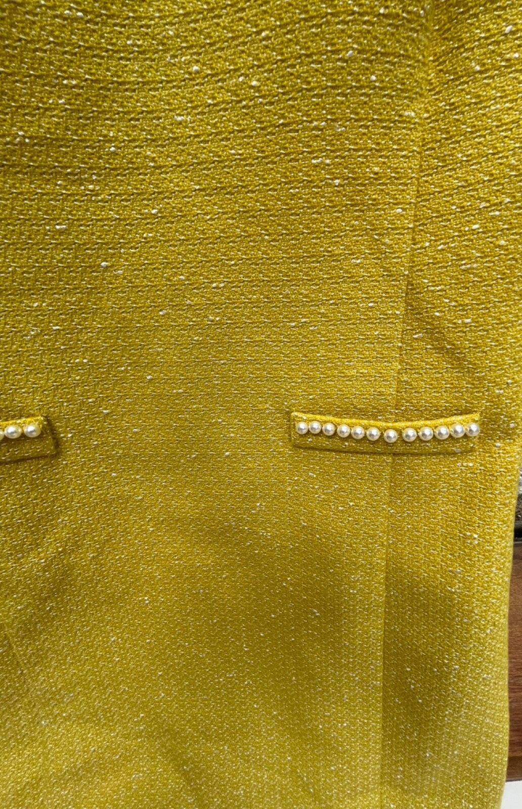 7574043
